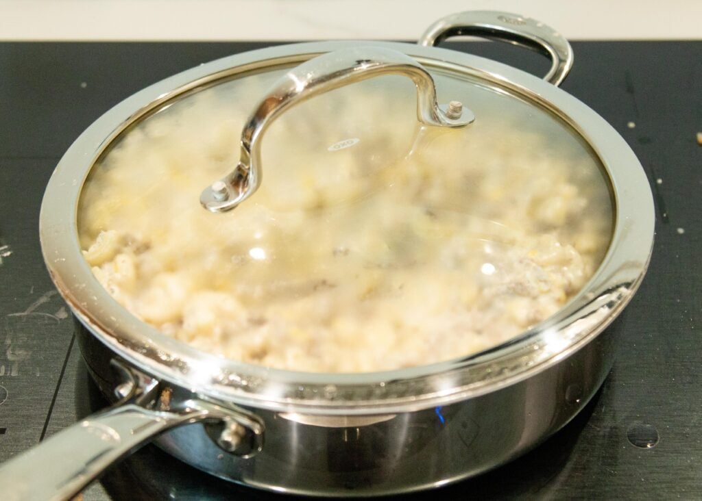 letting the dairy casserole heat with the lid on the pan
