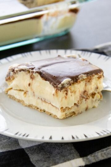 a square of eclair dessert on a plate