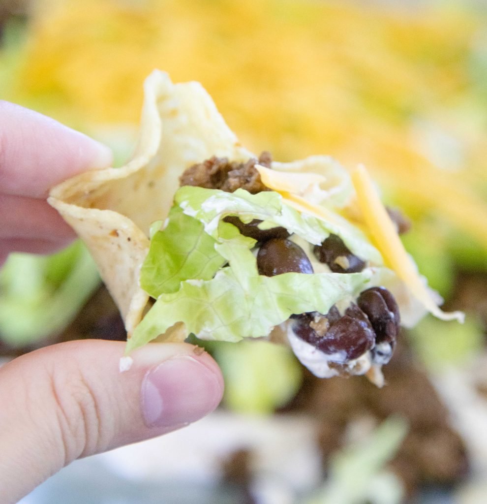 chip loaded with a pile of taco dip