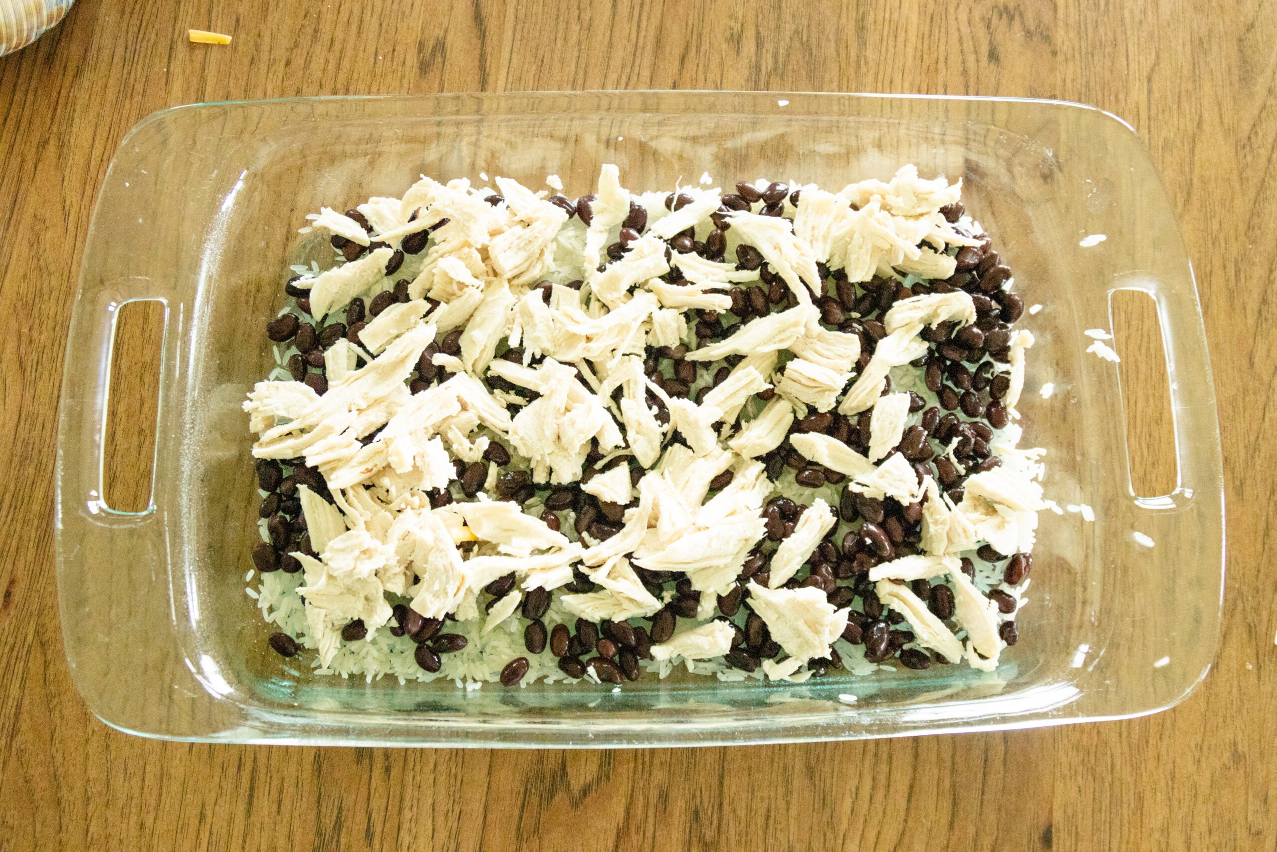 chicken and rice and beans in the casserole dish