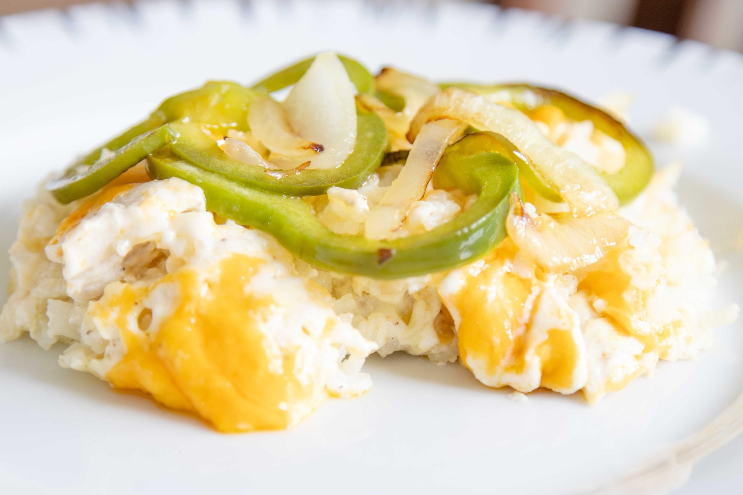 a serving of chicken and rice casserole plated and ready to eat