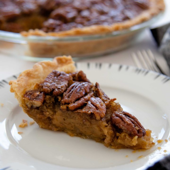 a slice of pecan pie on a plate