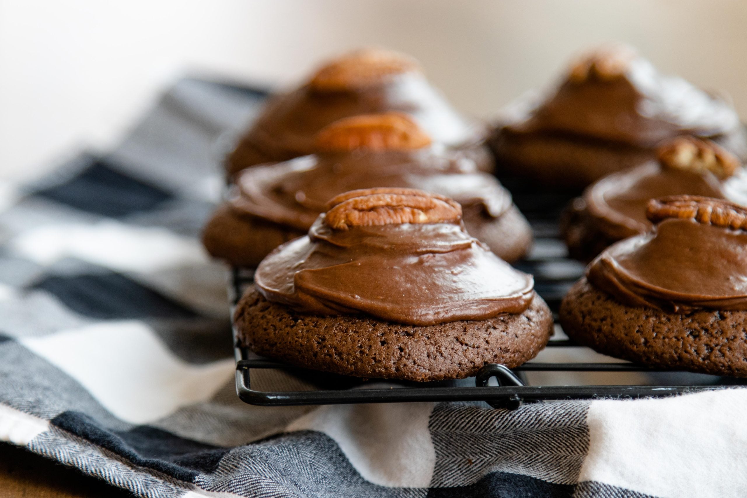 chocolate marshmallow surprise cookies on a wire rack