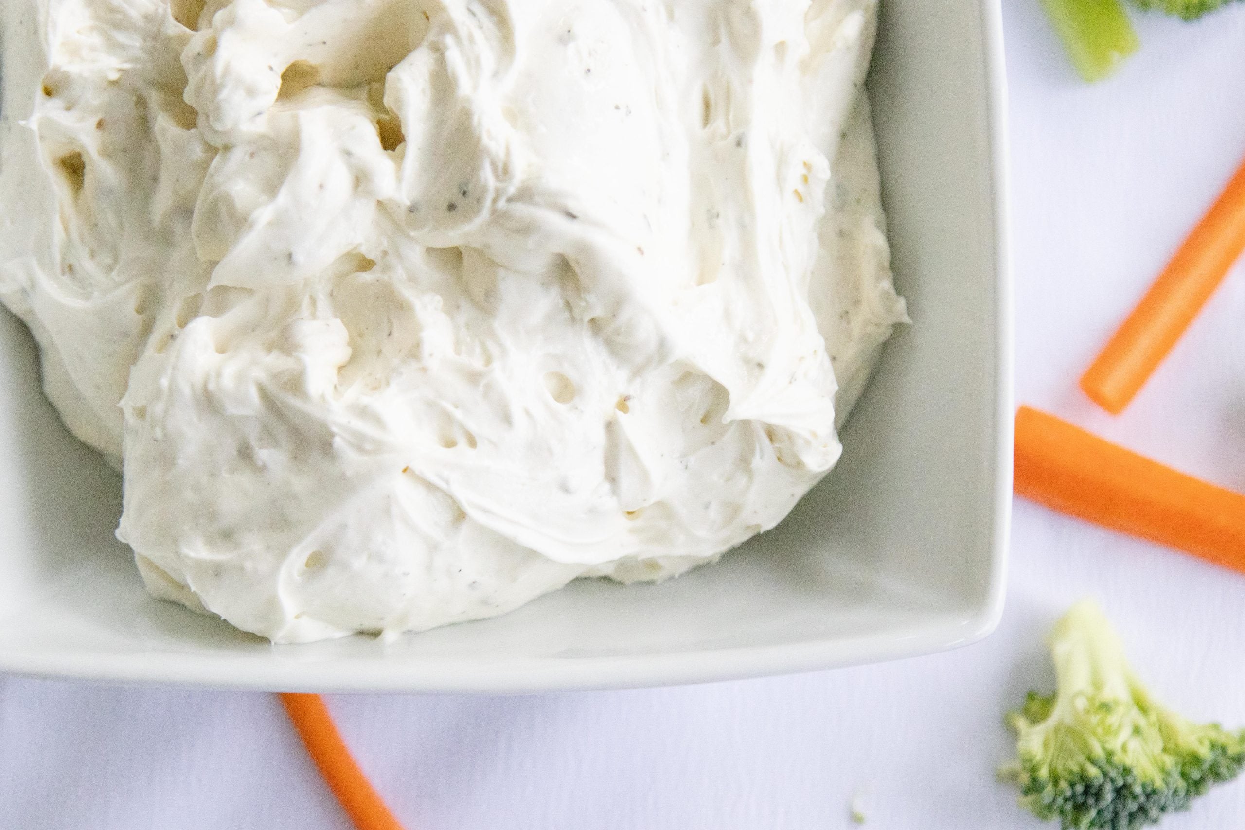 creamy ranch dip in a white bowl