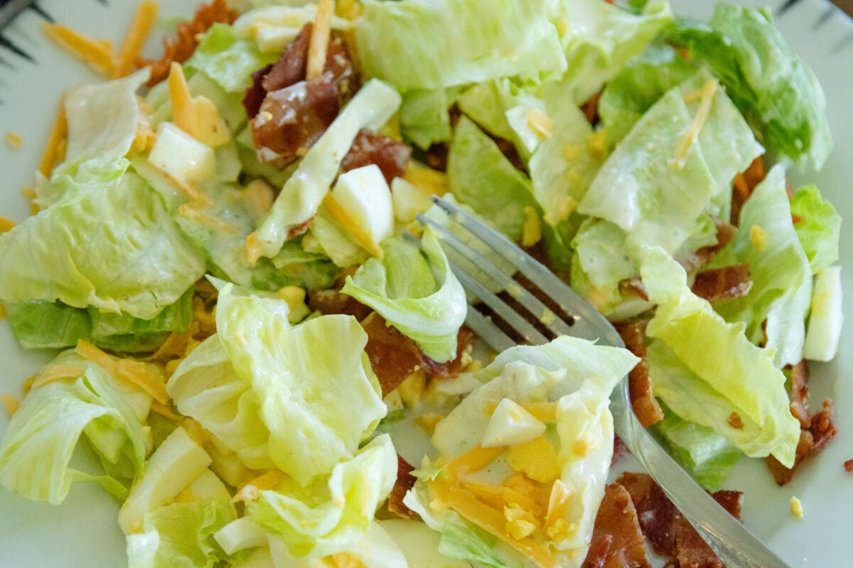 up close shot of corn chip lettuce salad