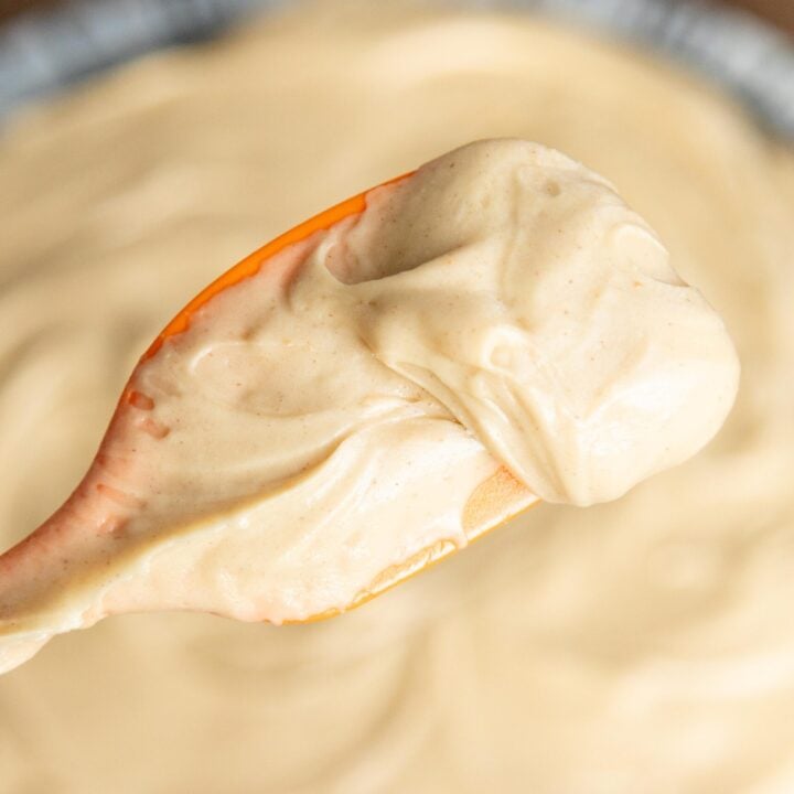 a scoop of peanut butter frosting on a spatula