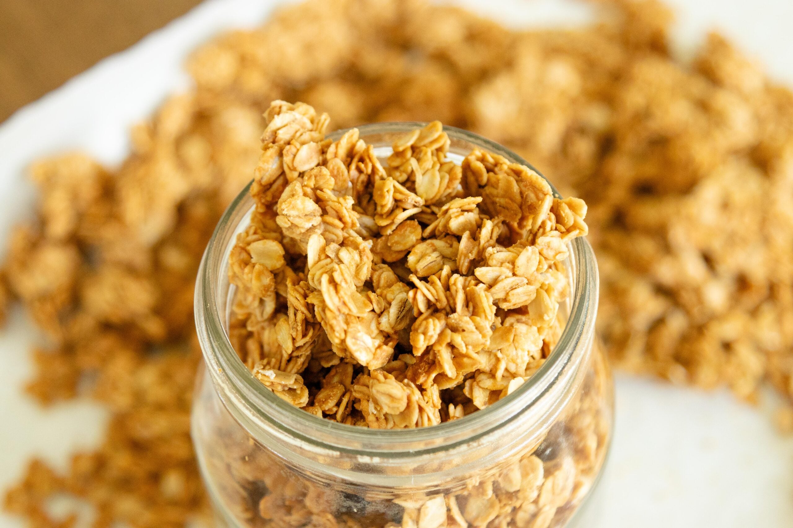 peanut butter oatmeal granola in a glass jar