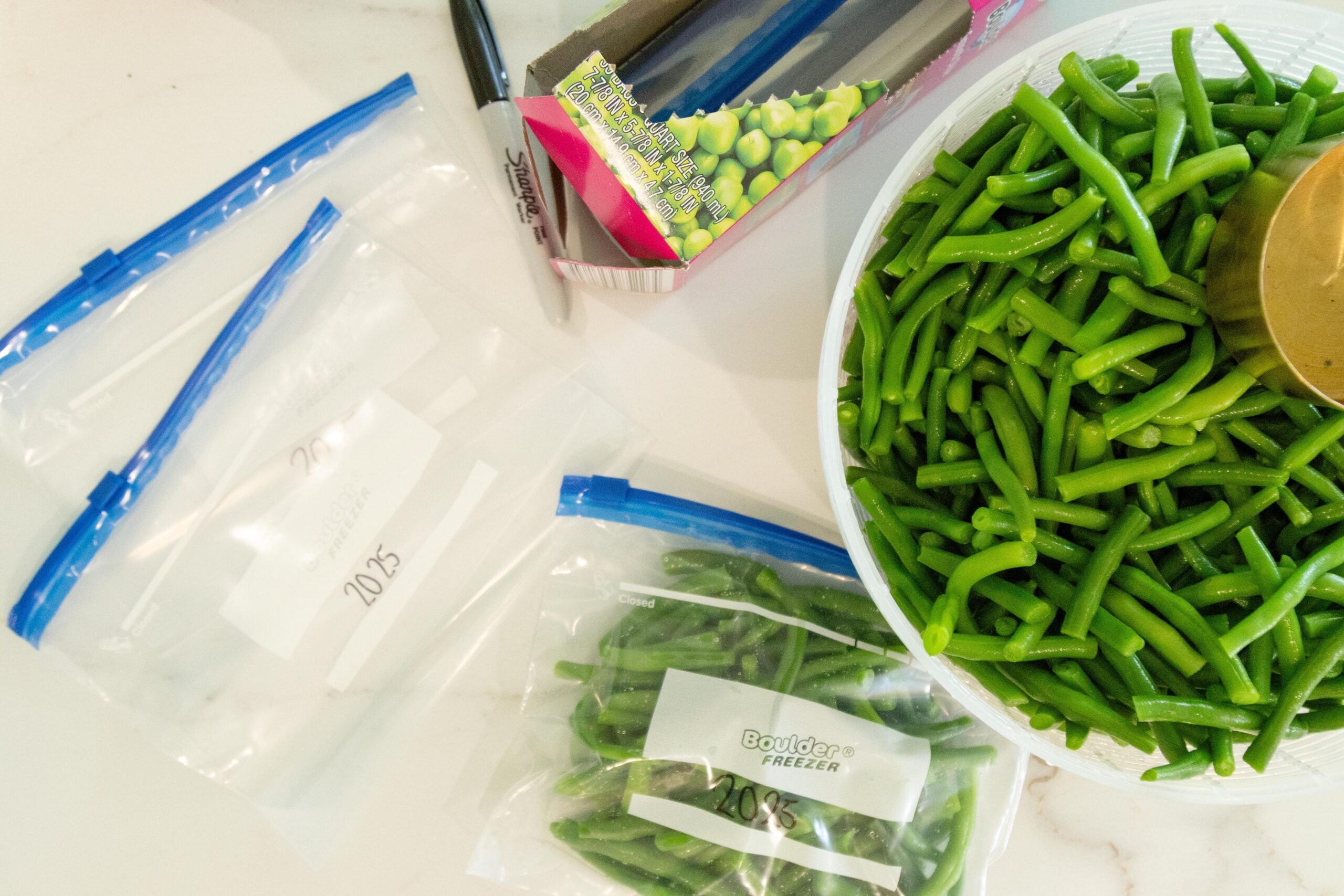 green bean packaging supplies on the counter