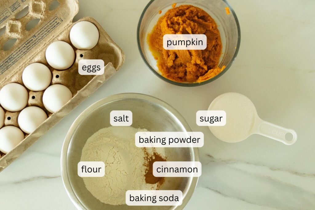ingredients for pumpkin cake roll setting on the counter