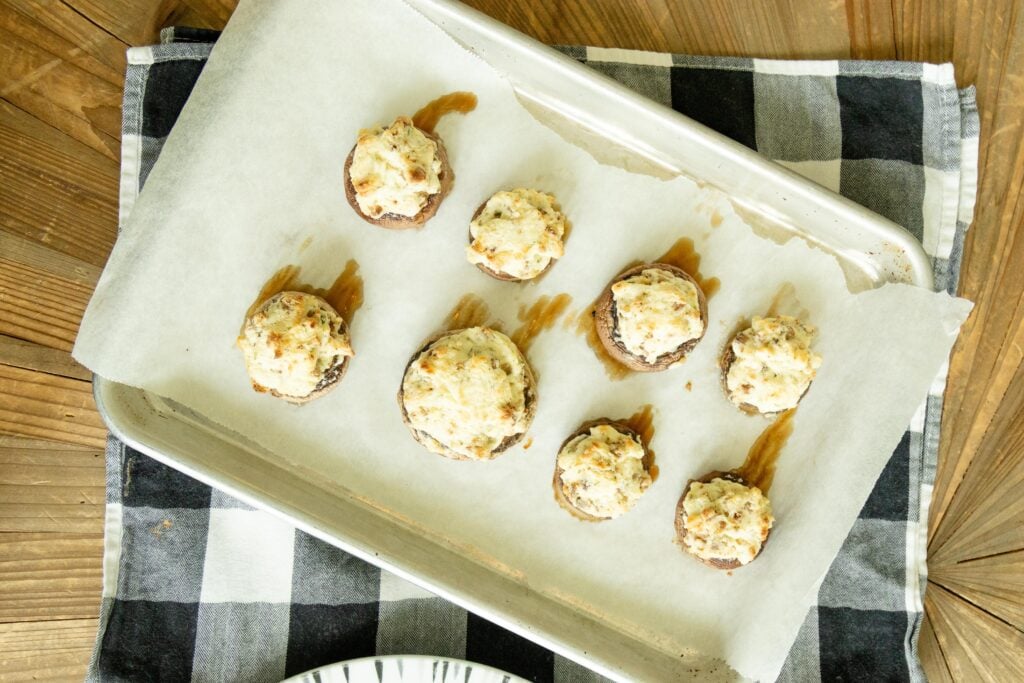 stuffed mushrooms on a tray fresh from the oven