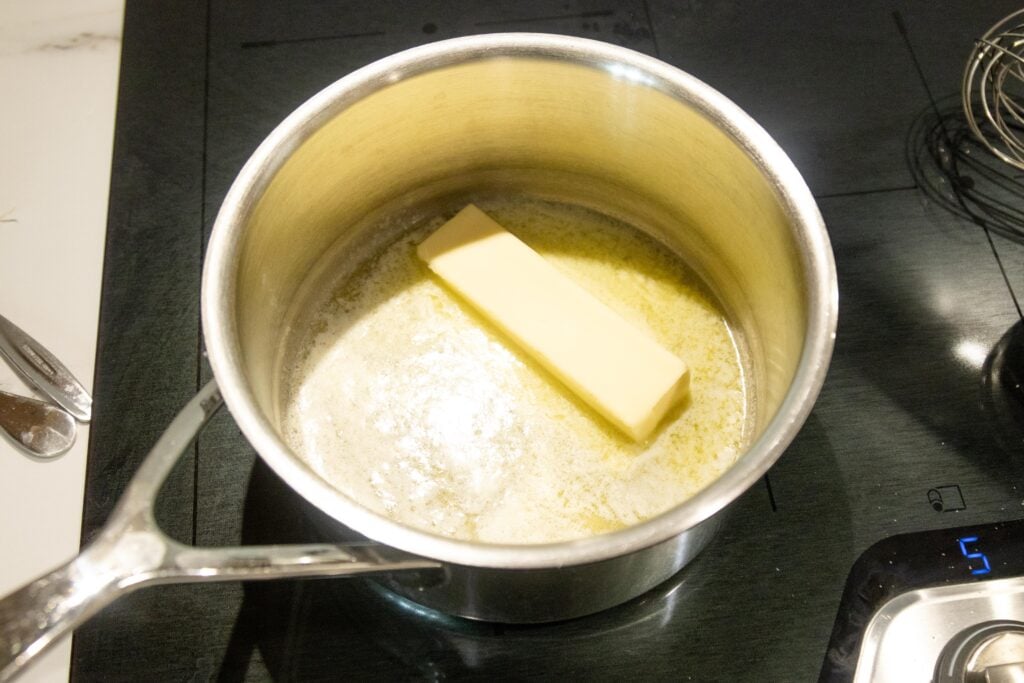 melting butter in a saucepan on the stovetop