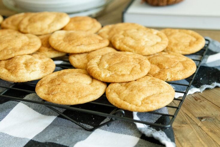 snickerdoodle cookies cooling on a wire rack