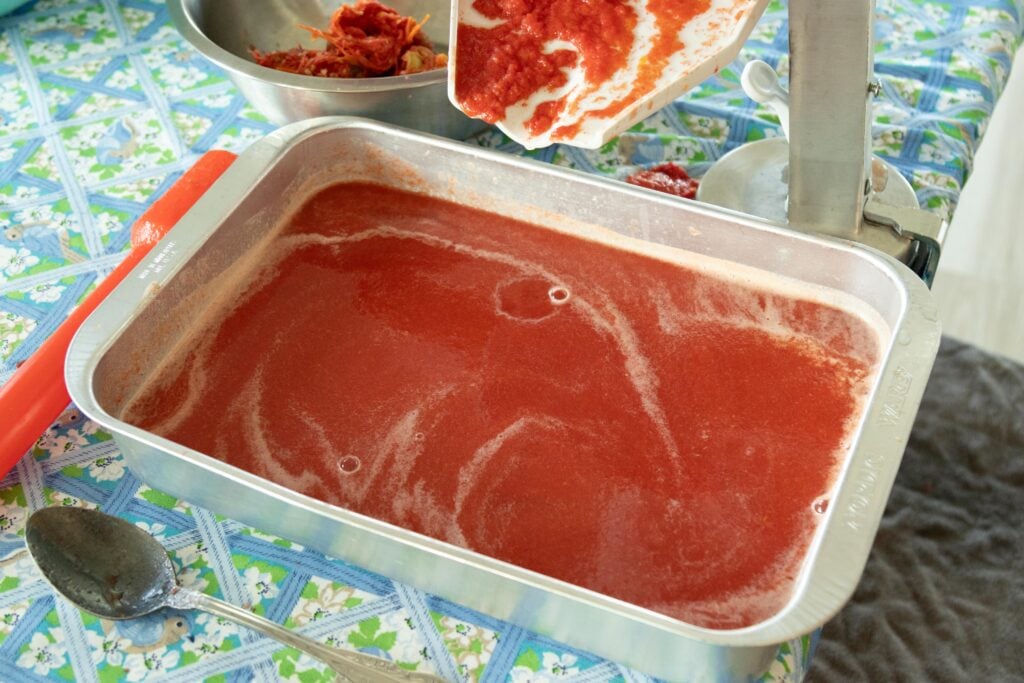 a pan full of thick tomato juice