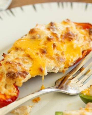stuffed pepper on a plate with a fork