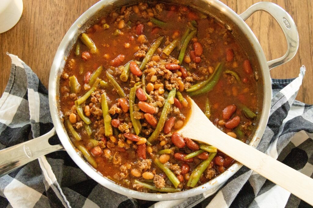 a pot of three bean casserole on the table