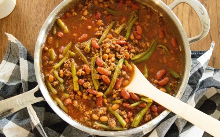 a pot of three bean casserole on the table
