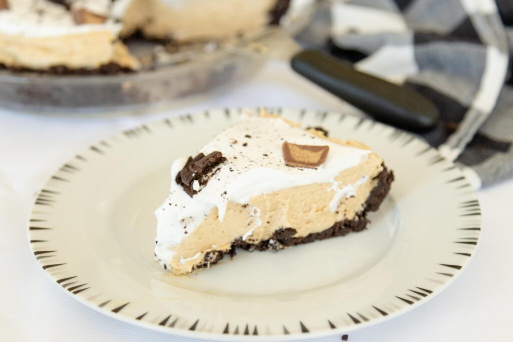 a slice of peanut butter oreo pie on a plate