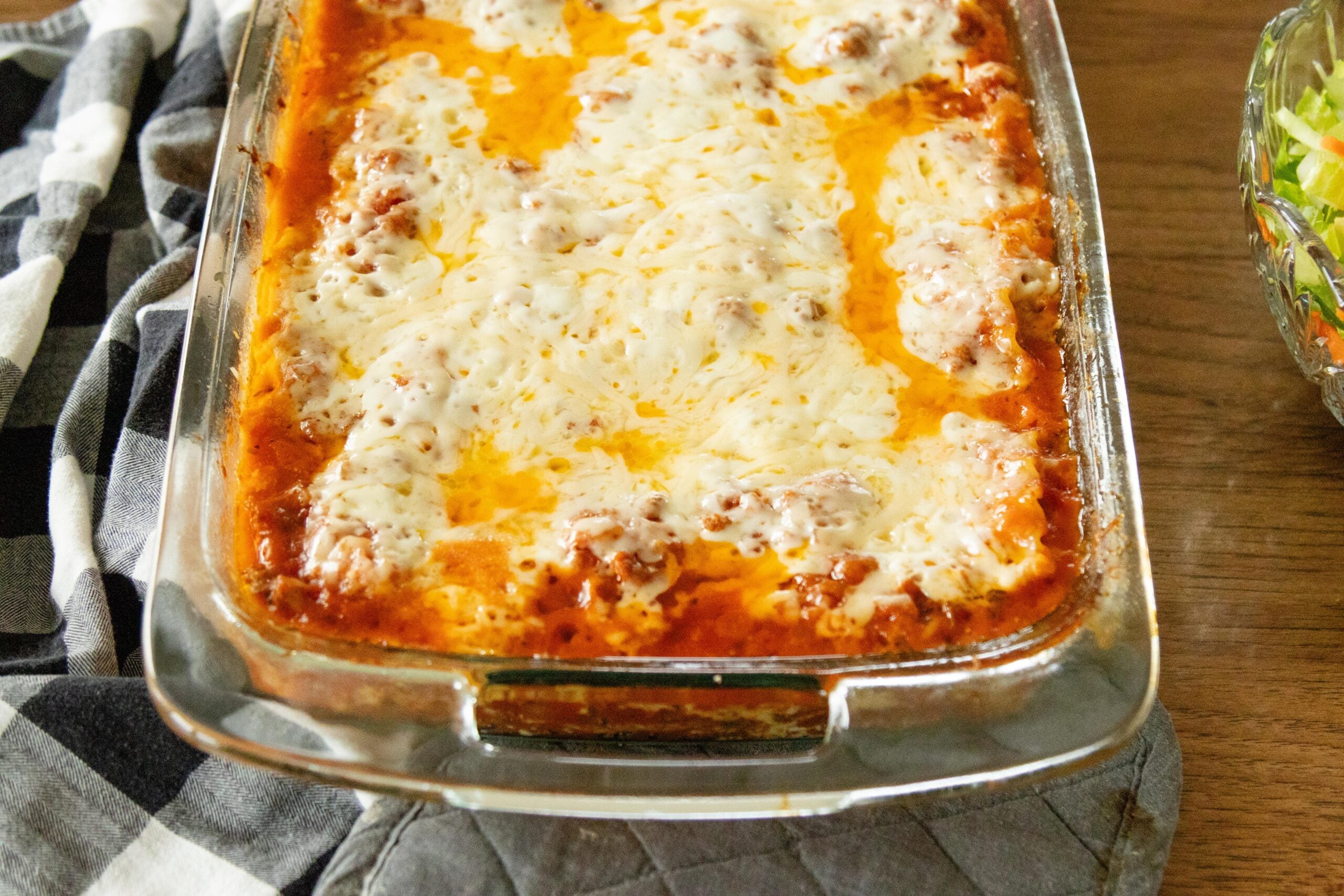 a freshly baked pan of lasagna on the table