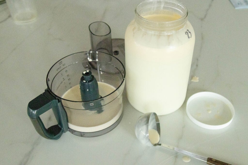 the supplies for making raw milk butter setting on the counter