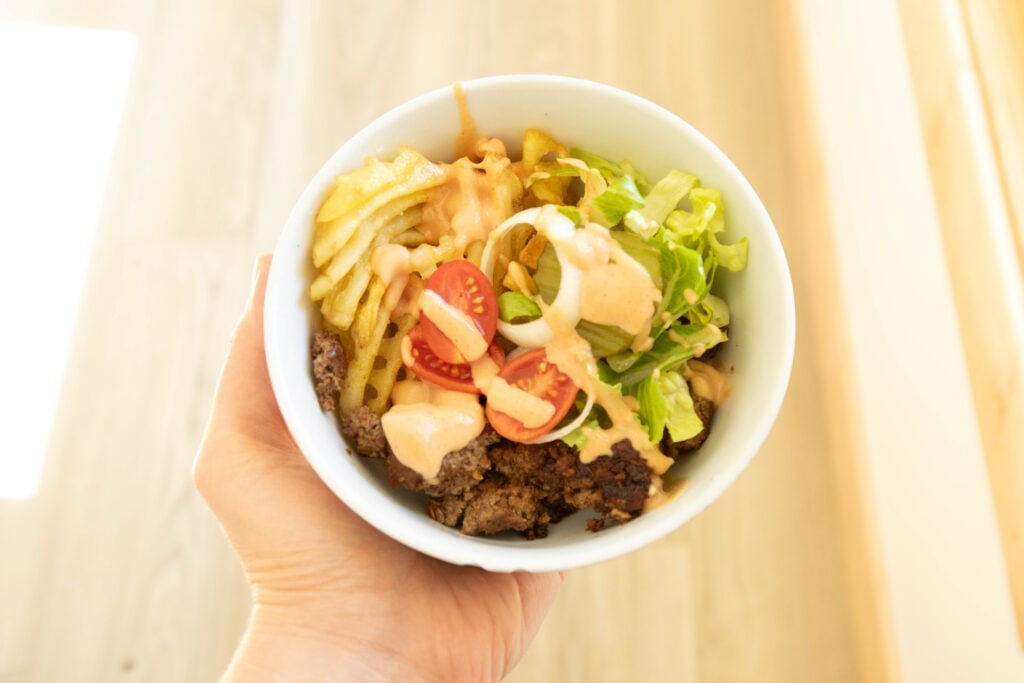 me holding a big mac burger bowl