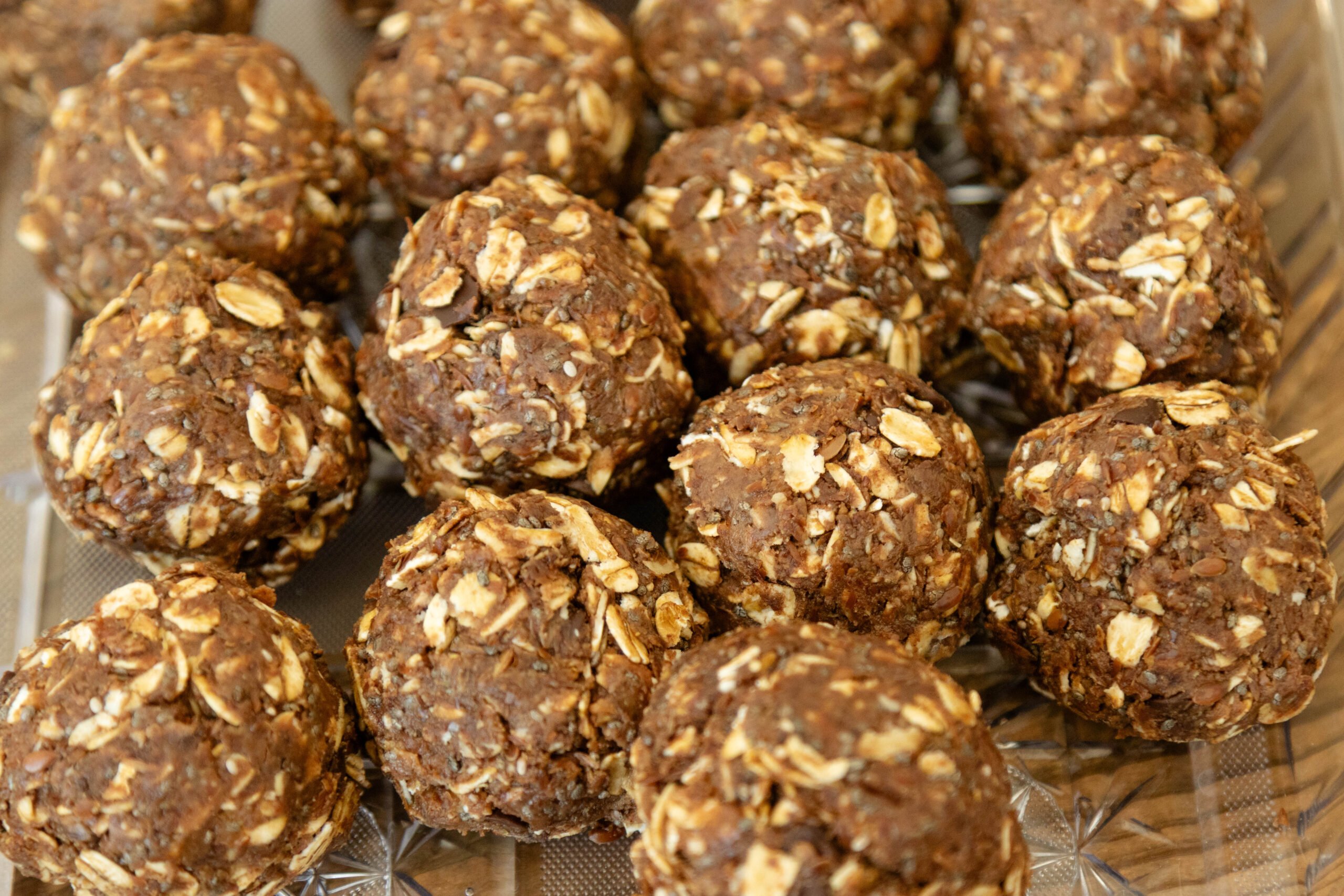 a bunch of protein balls on a tray