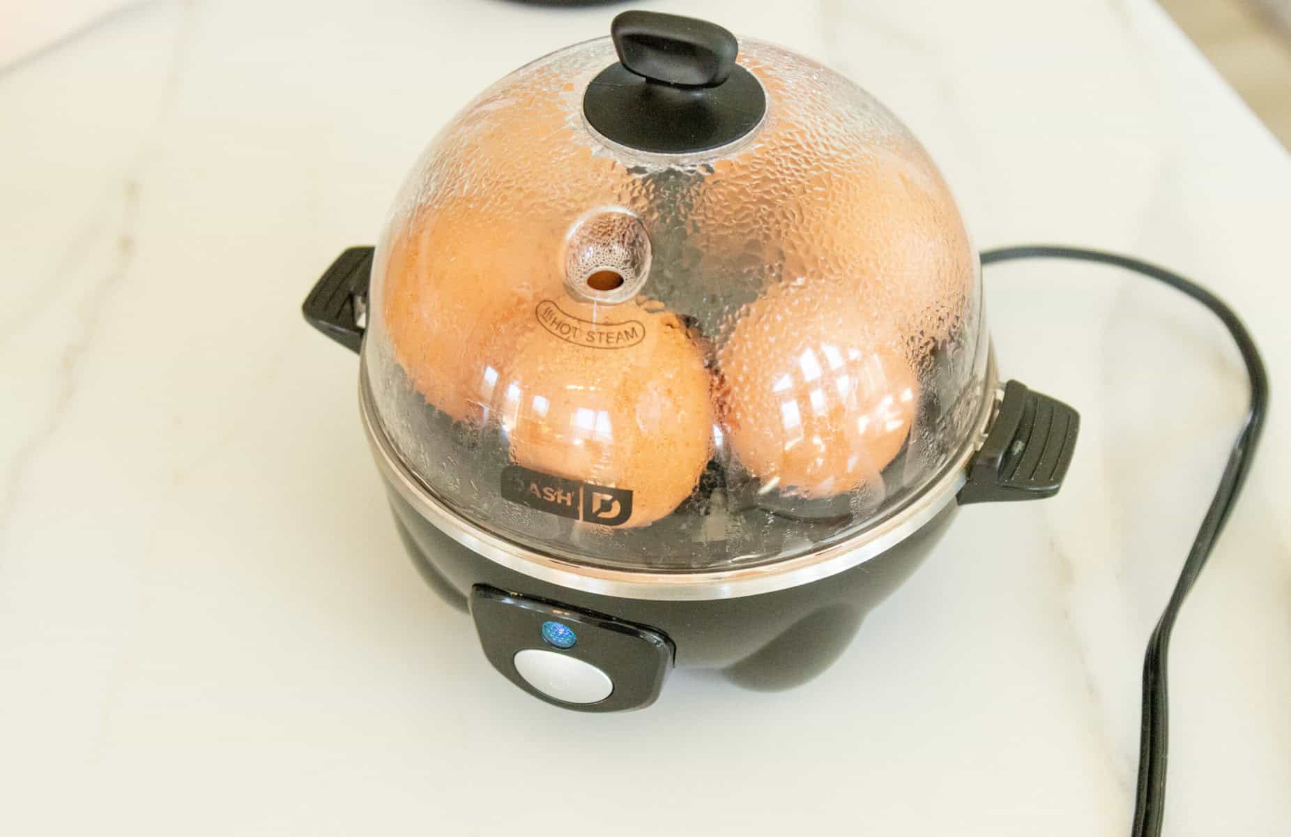 eggs cooking in an egg cooker