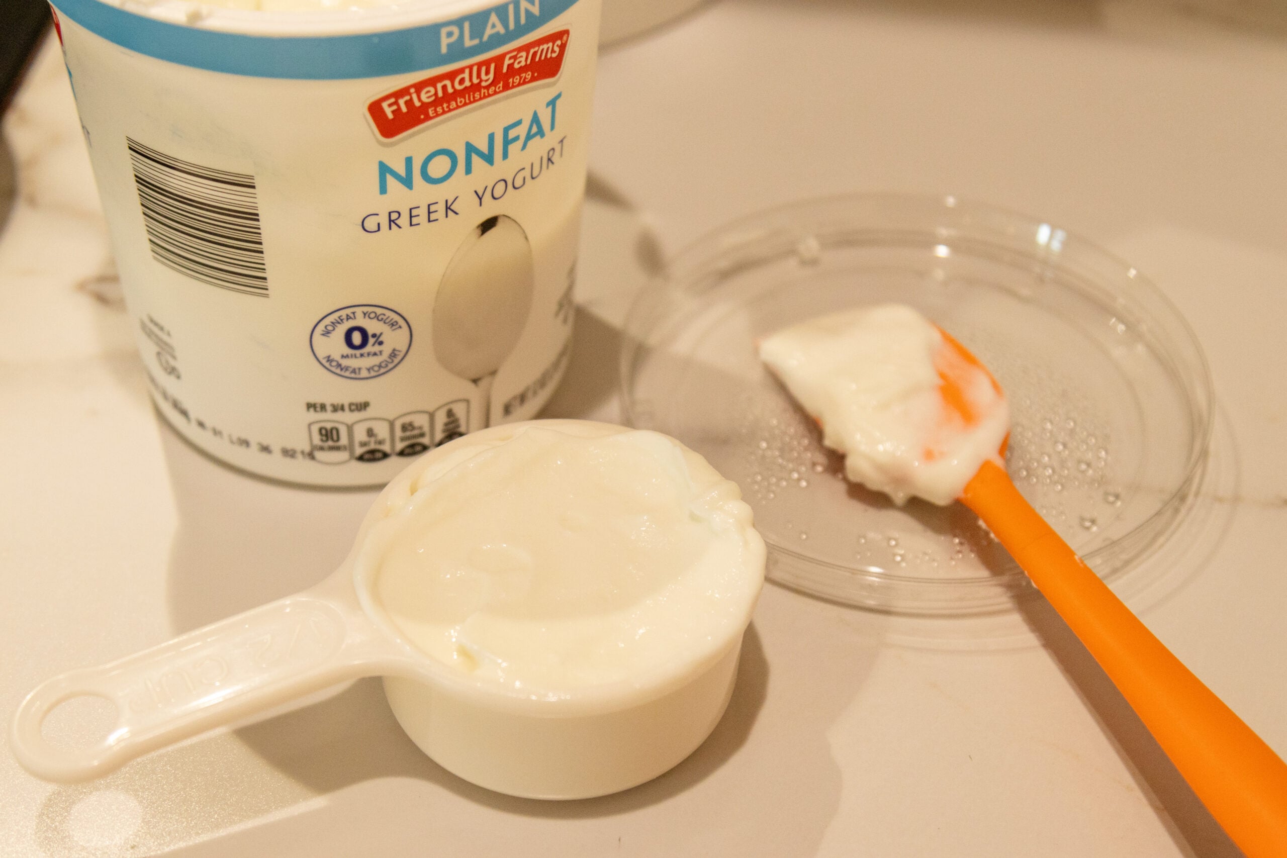 the yogurt starter culture in a measuring cup