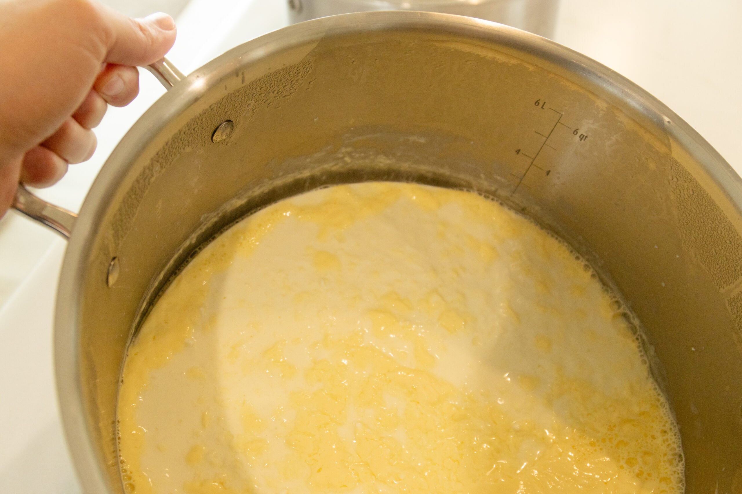 tipping the yogurt pot to see if its done