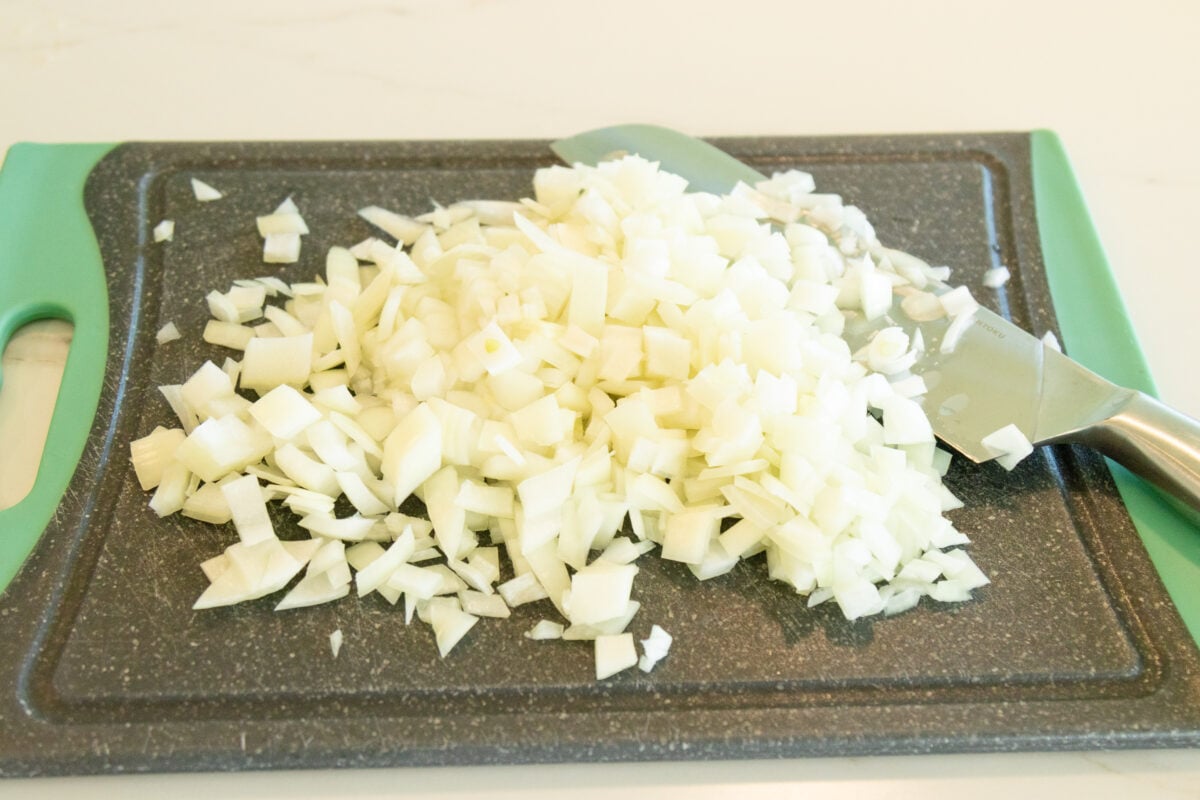 diced onion on a cutting board