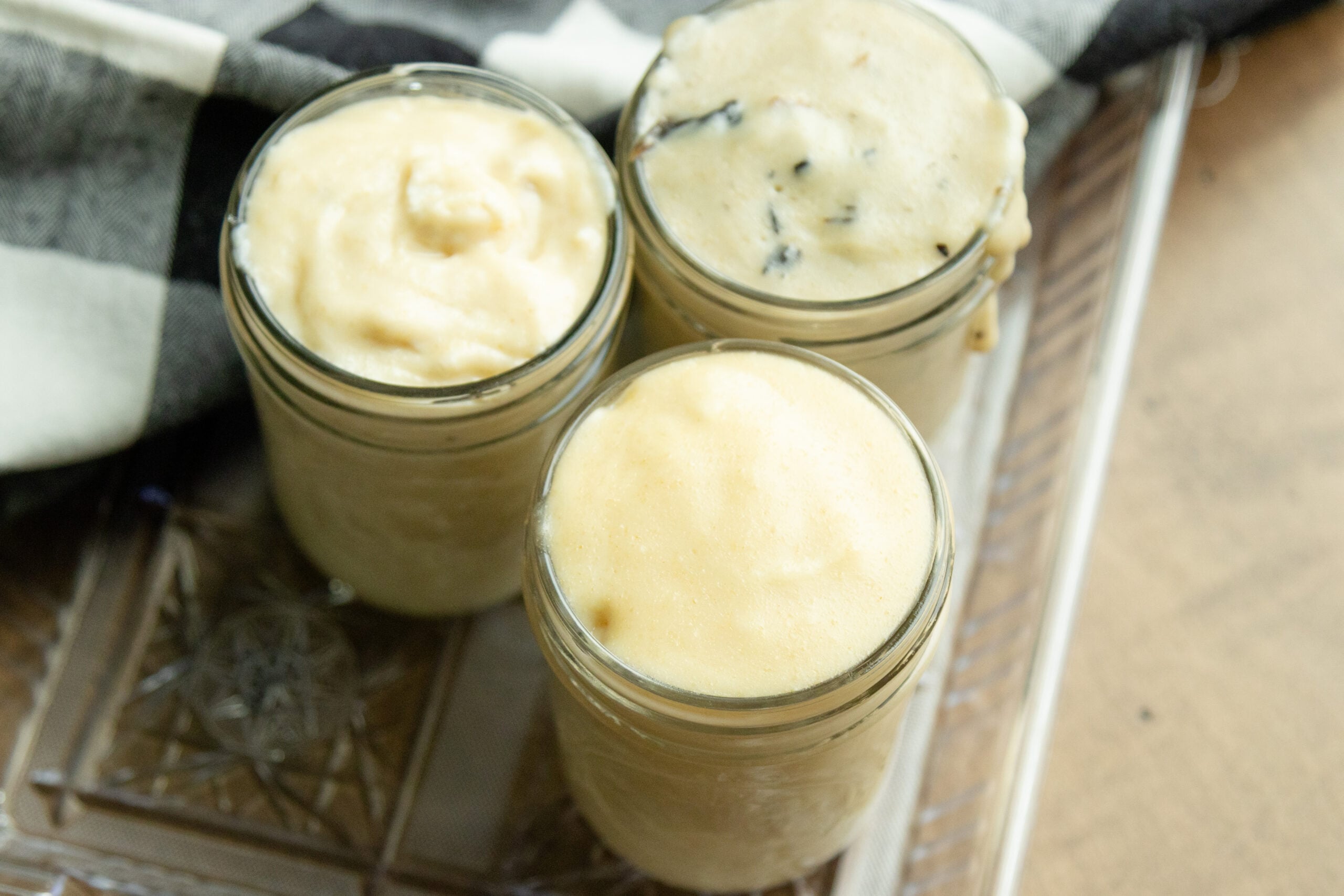 3 cans of condensed cream soup on a tray