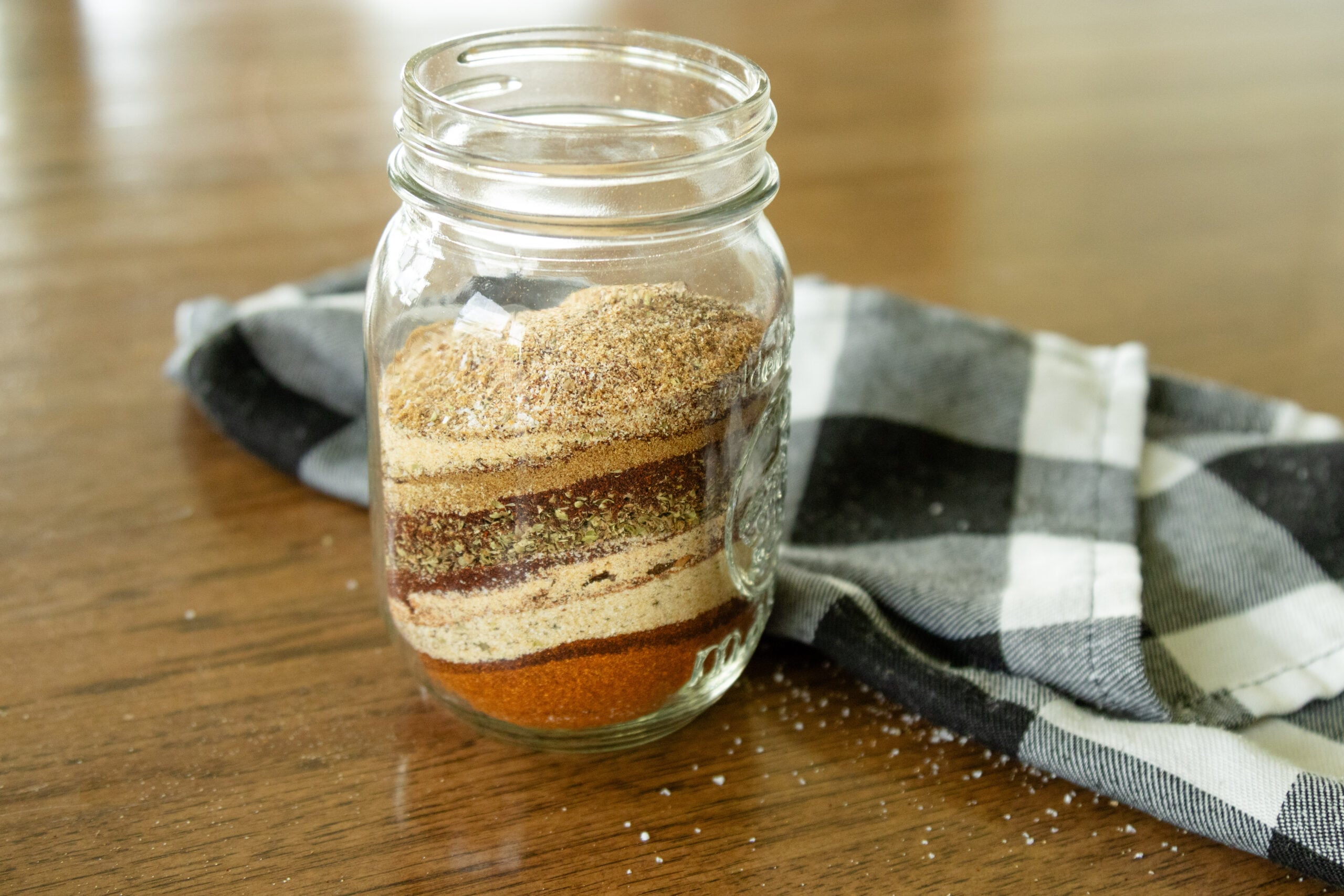 taco seasoning ingredients in a jar