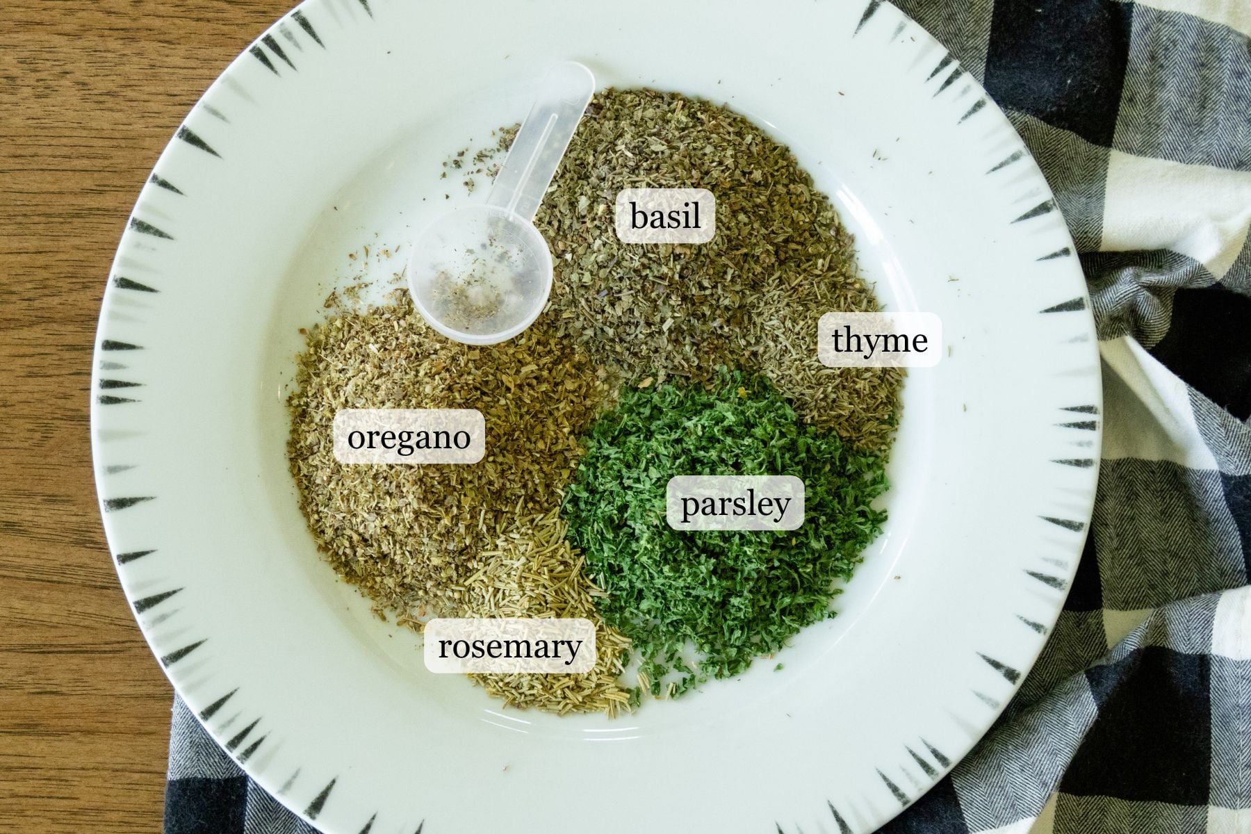 ingredients for Italian seasoning on a plate