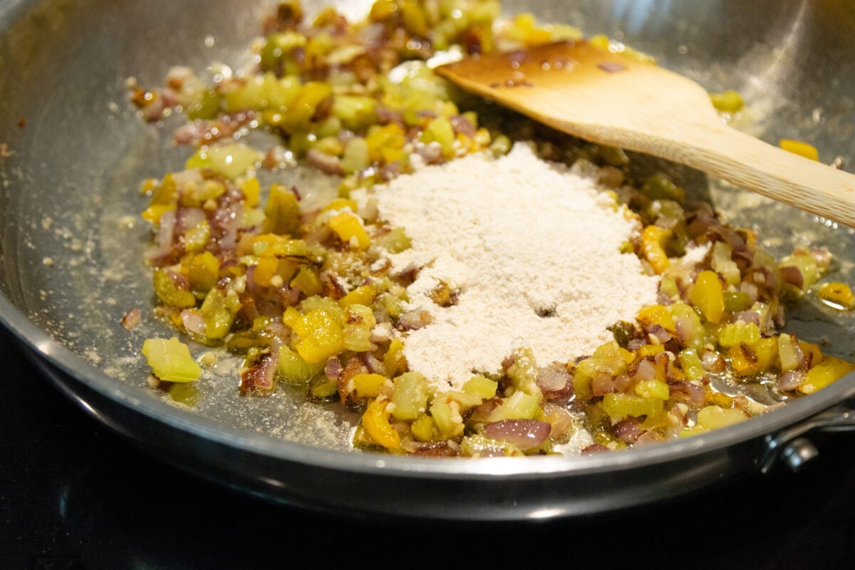 adding the flour to the pan