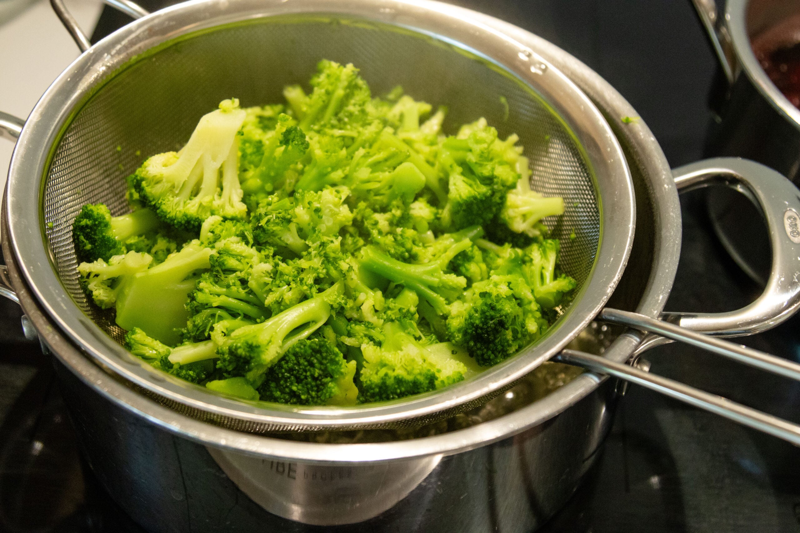 broccoli steaming on the stovetop