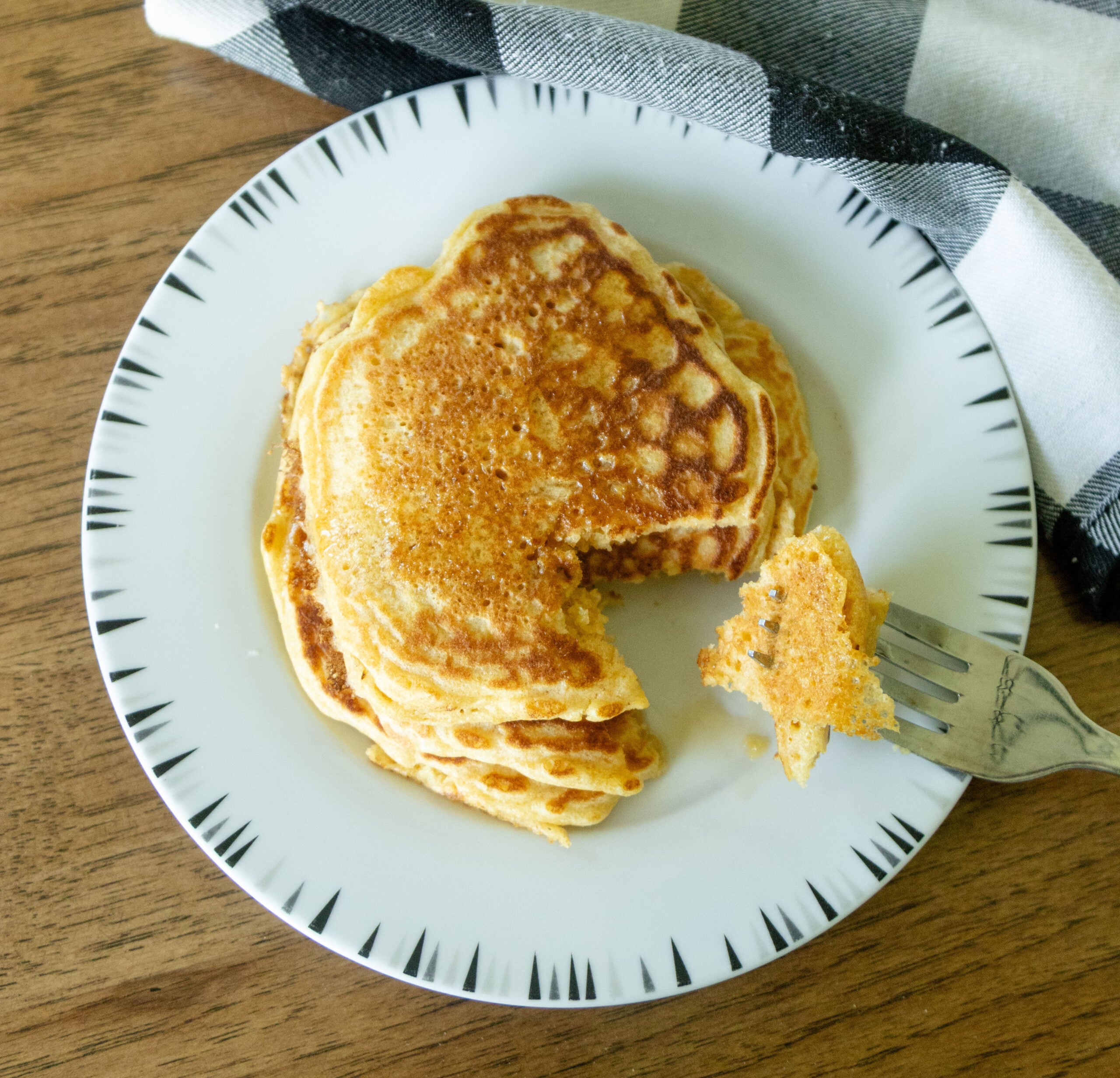 a bite of pancake on a fork