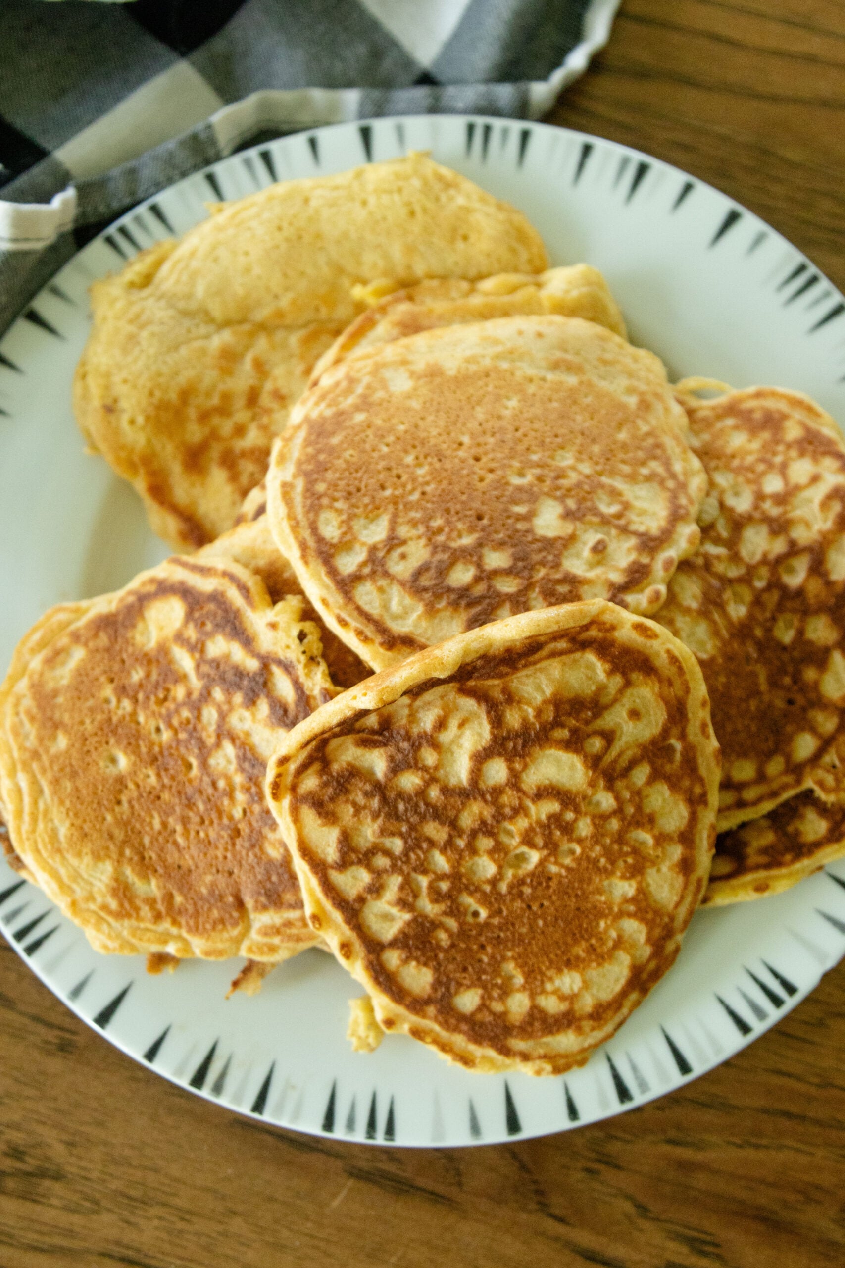 a plate full of fresh milled flour pancakes