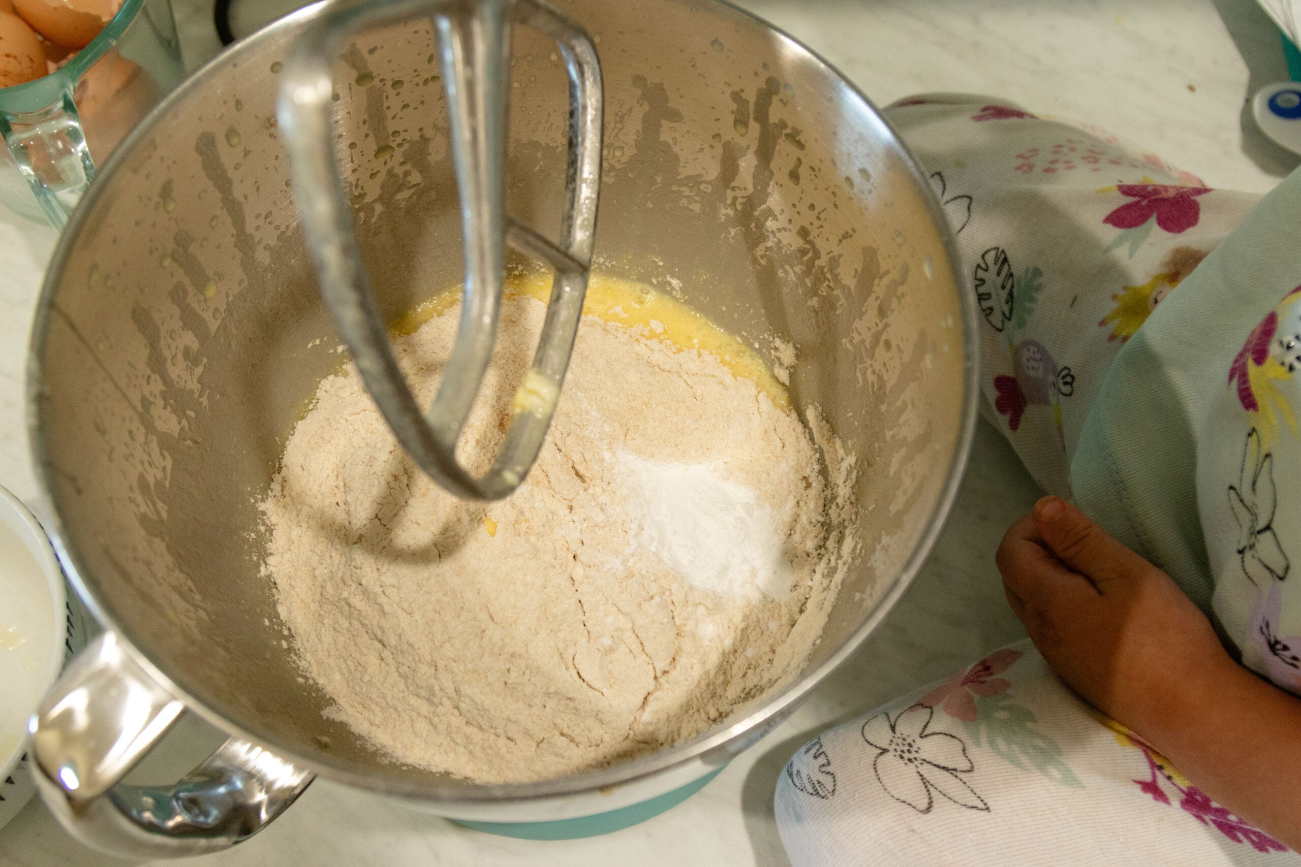 adding the dry ingredients to the batter