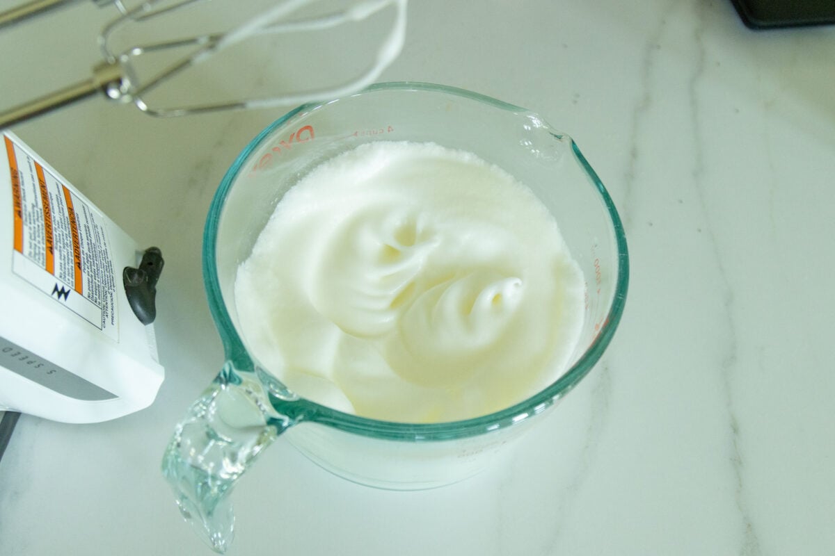 stiffly beaten egg whites in a bowl