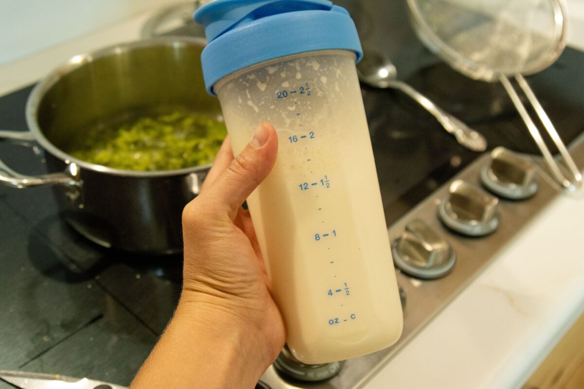 shaking the milk and flour together in the shaker bottle