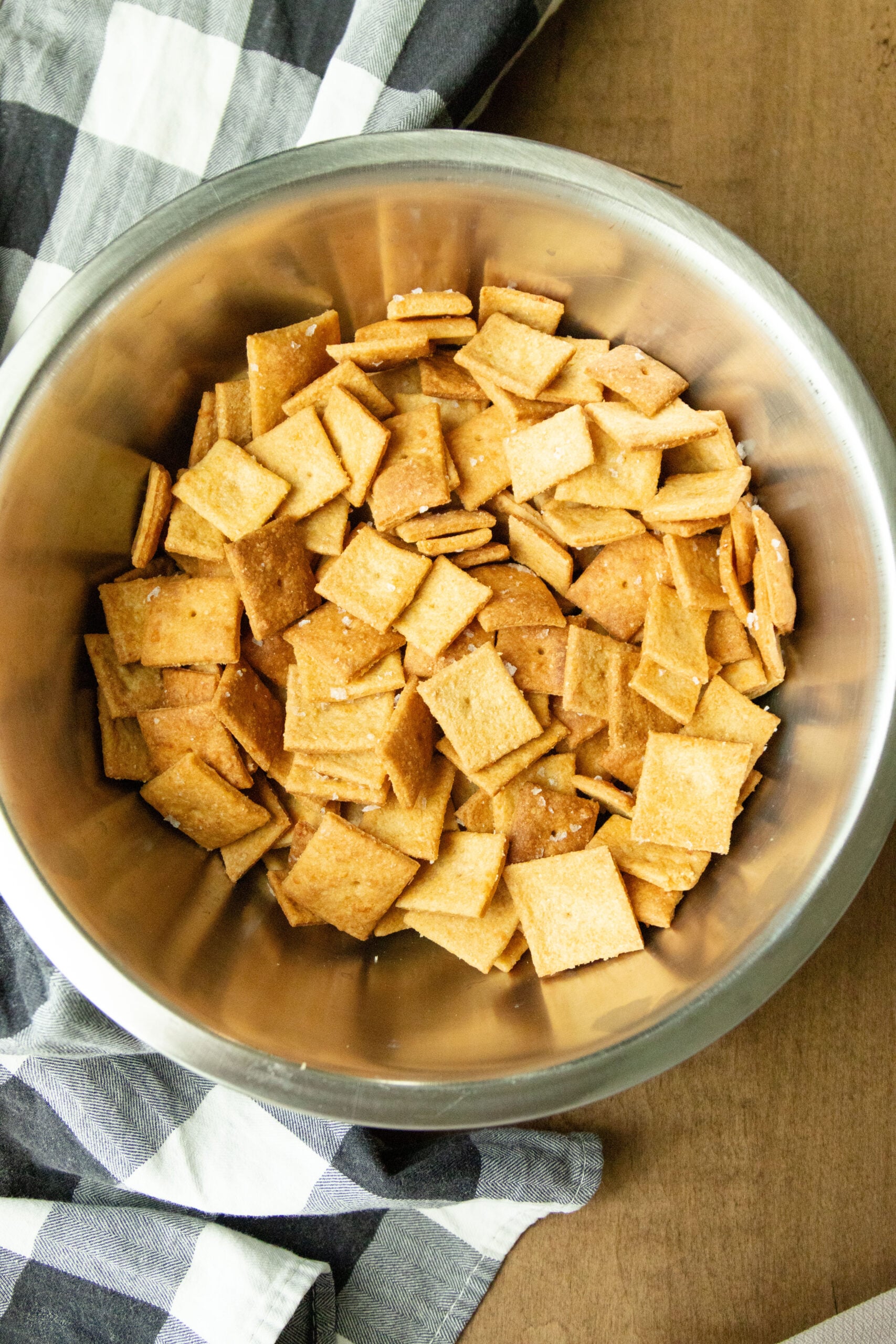 a bowl full of cheddar cheese crackers