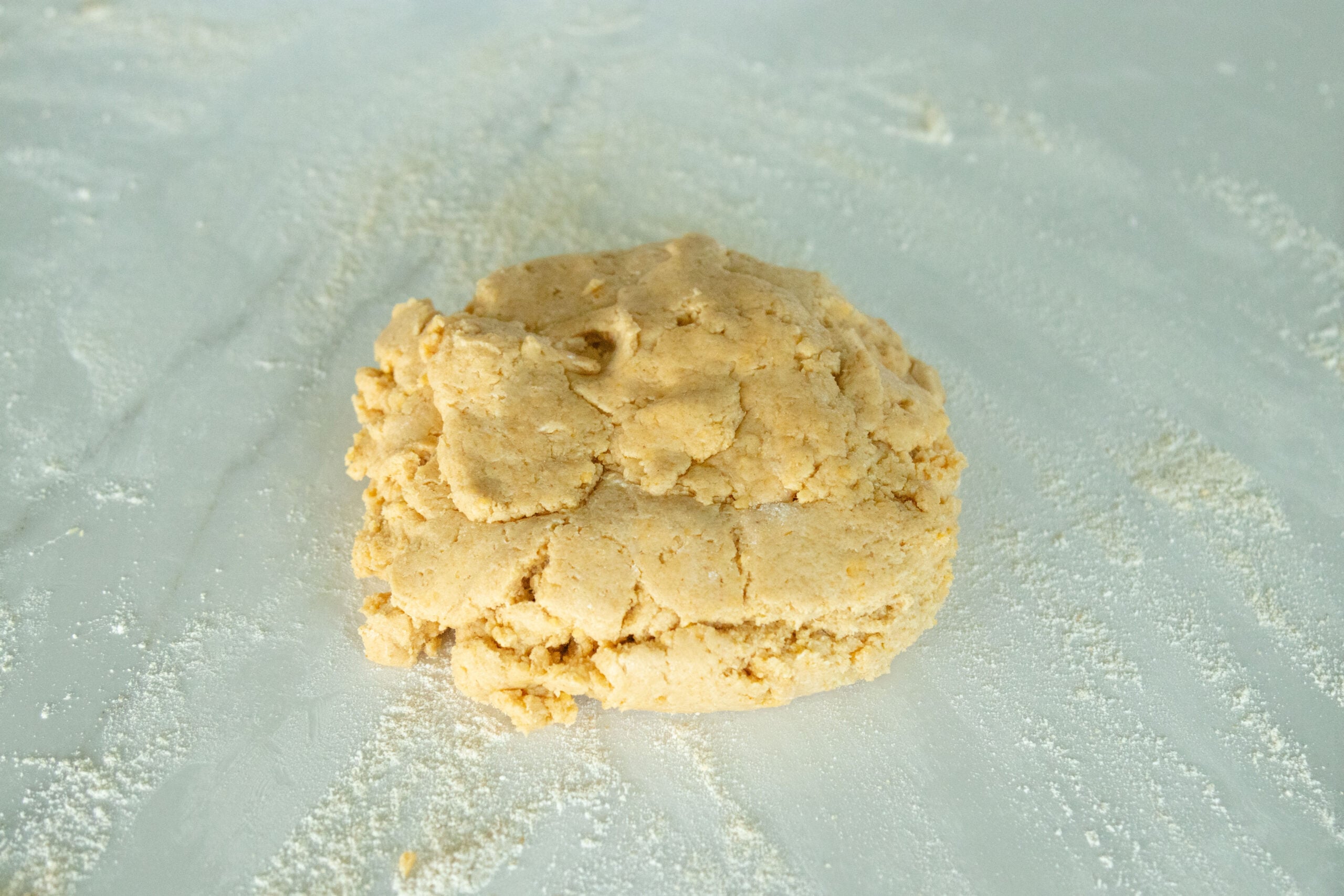 a lump of cheese cracker dough on the counter