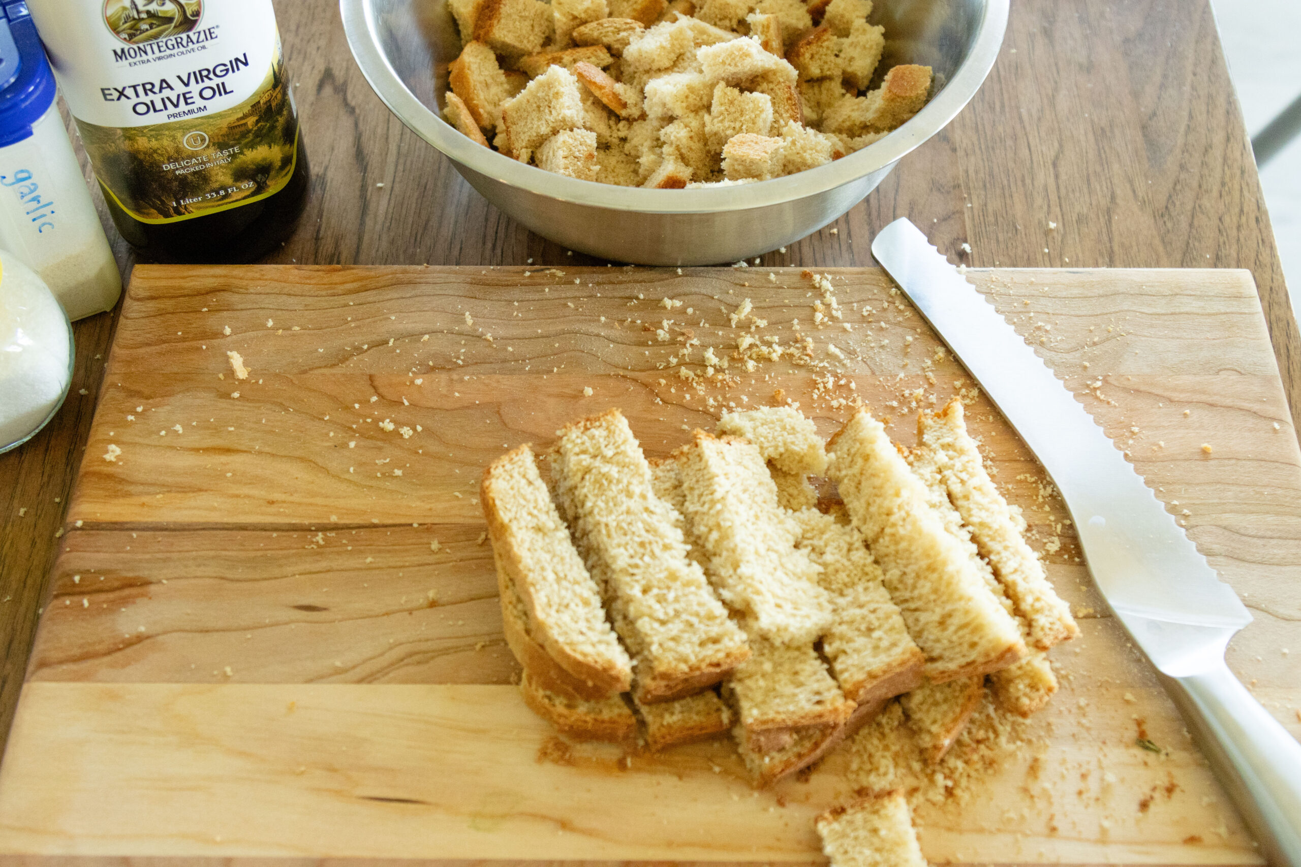 chopping the bread on a cutting board