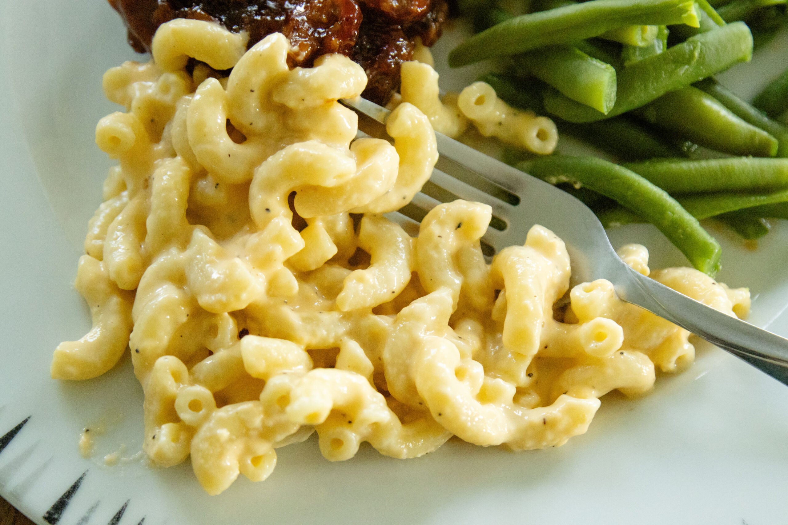 a serving of mac and cheese on a plate