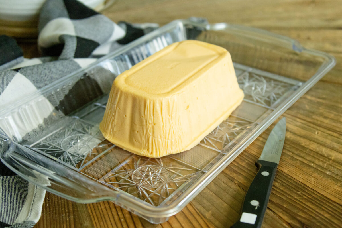 the finished block of velveeta cheese on a platter