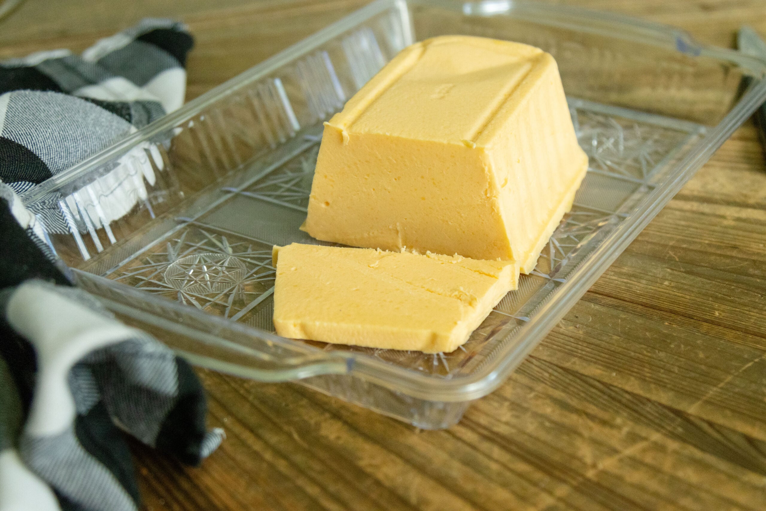 the finished block of velveeta cheese on a platter