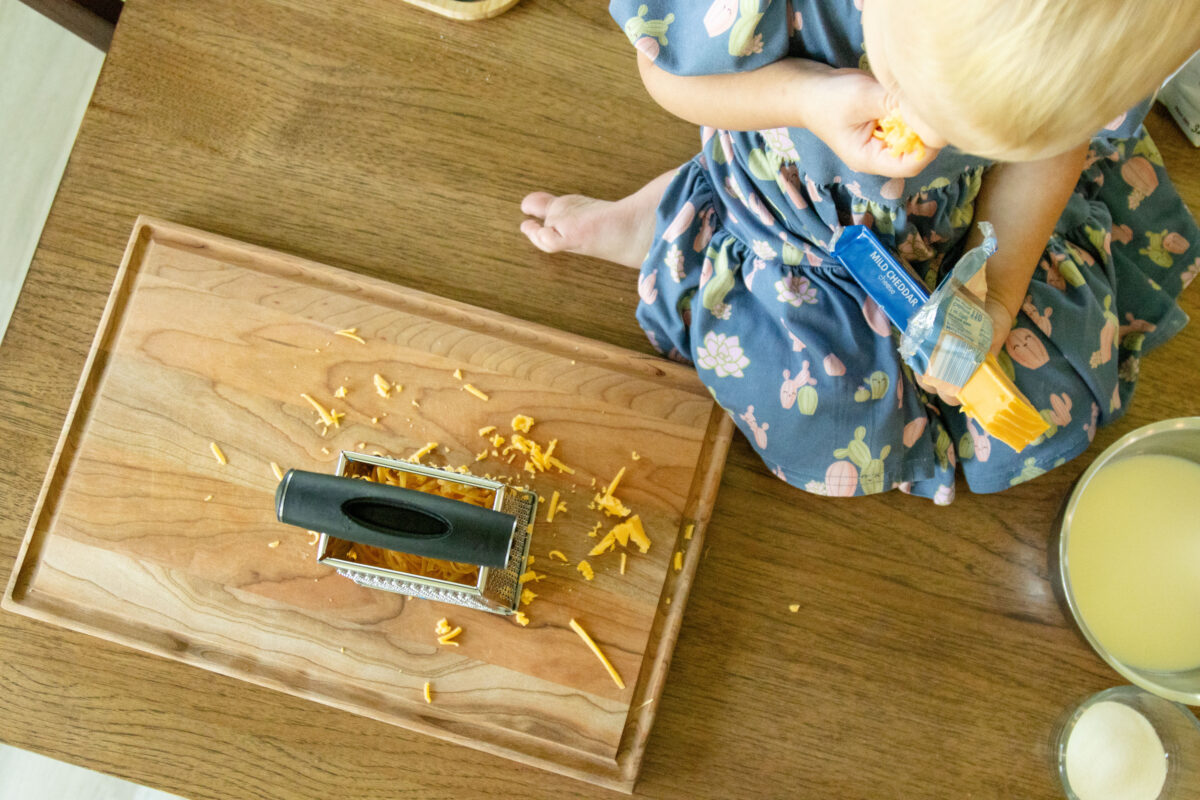 Alethea, helping shred the cheese