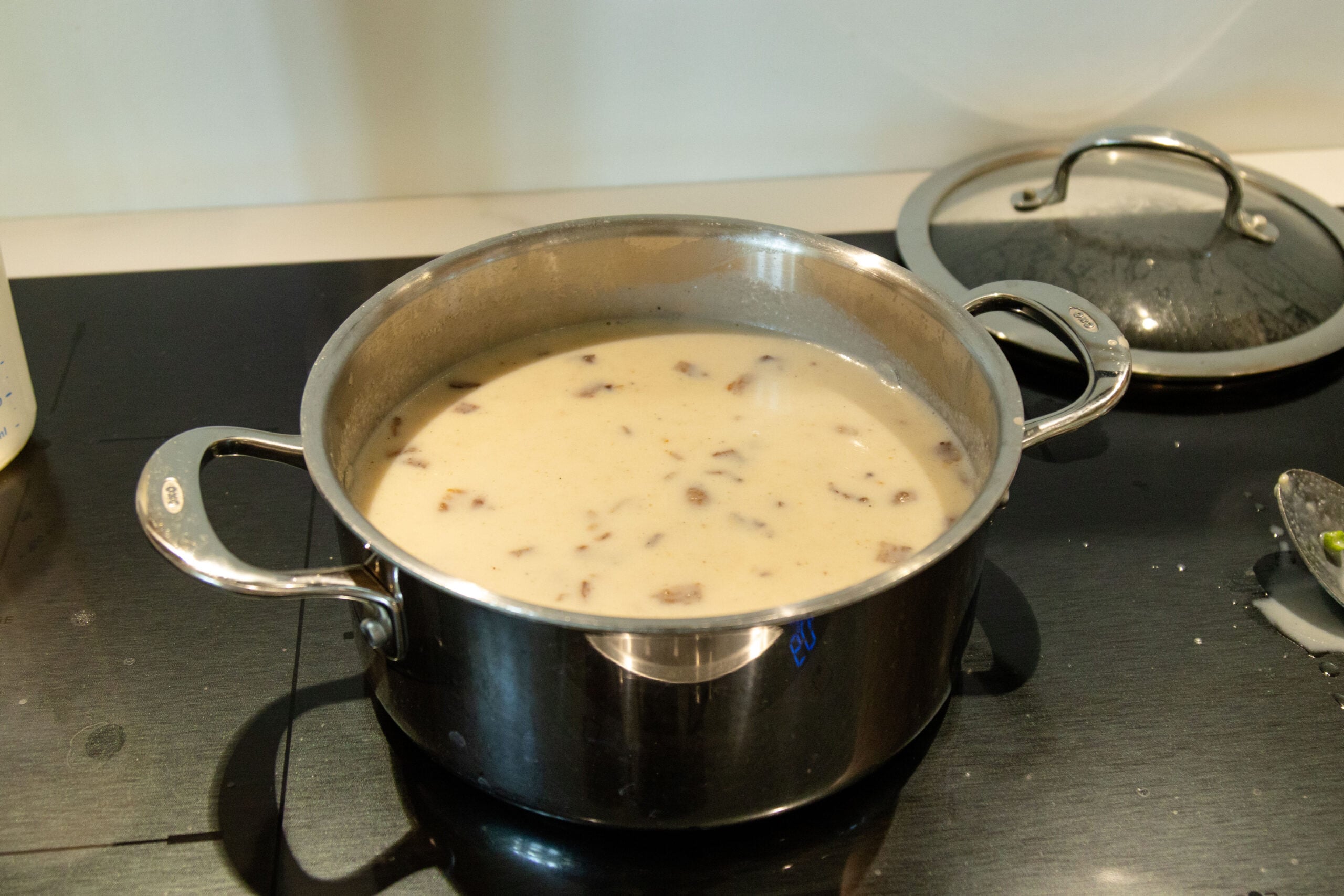 loaded potato soup in the pot on the stove