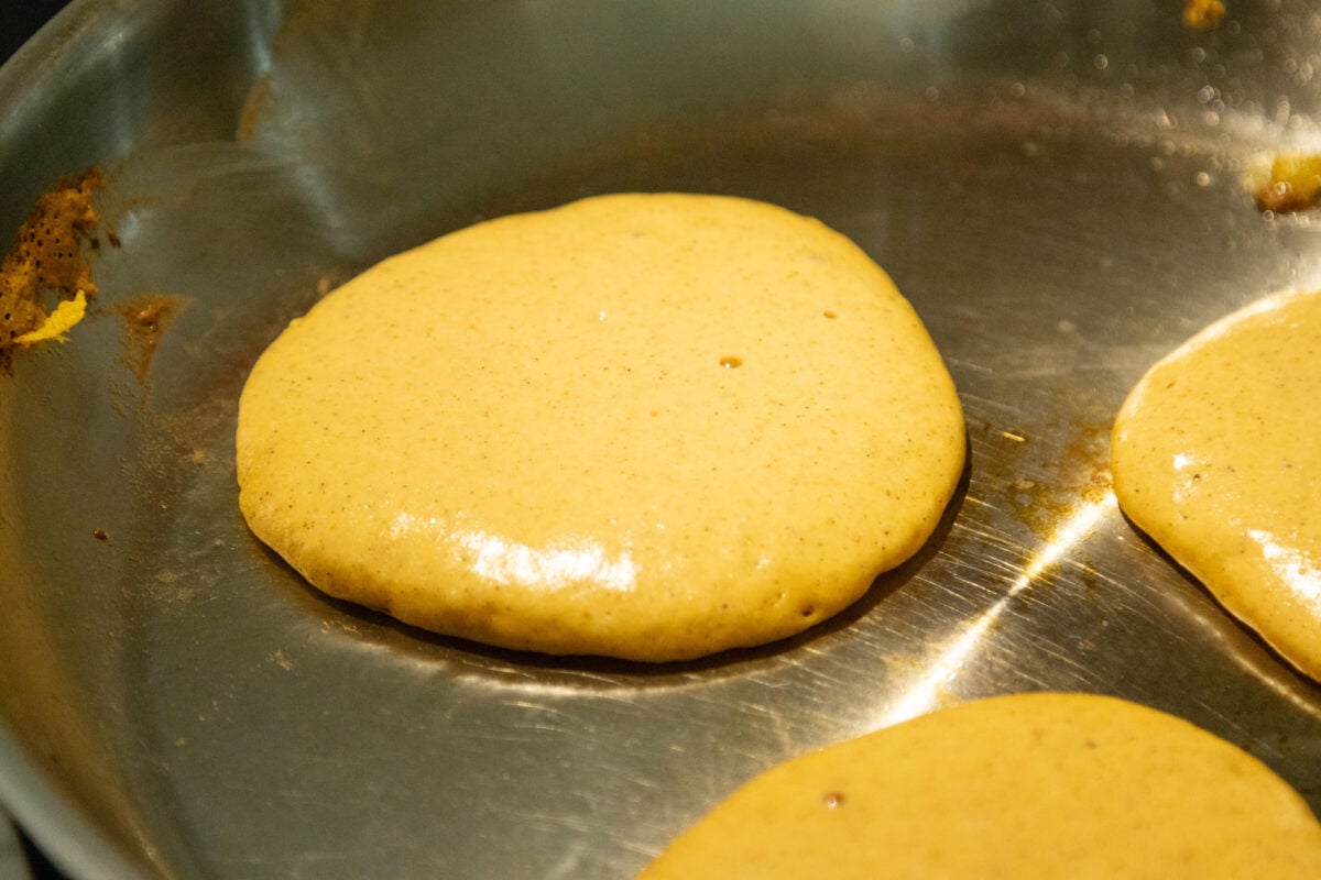 a pancake frying in the pan