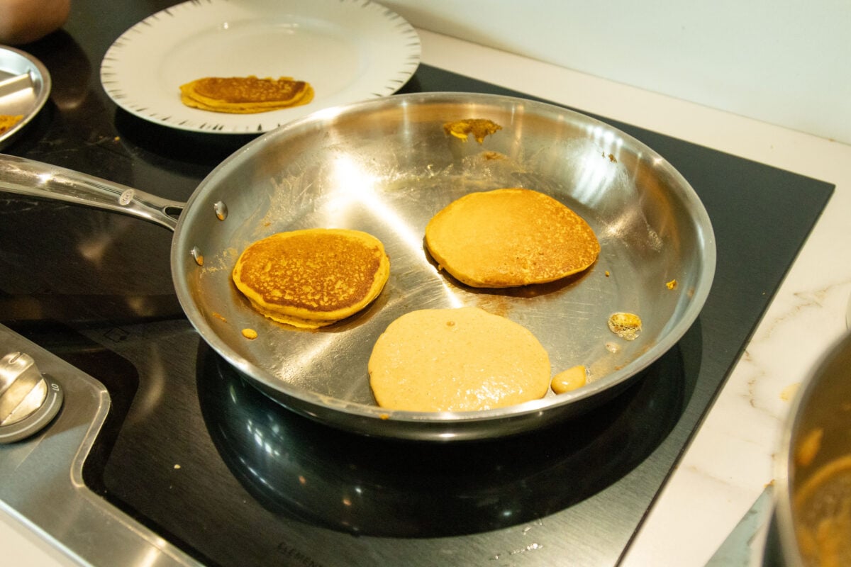 pancakes frying in a pan