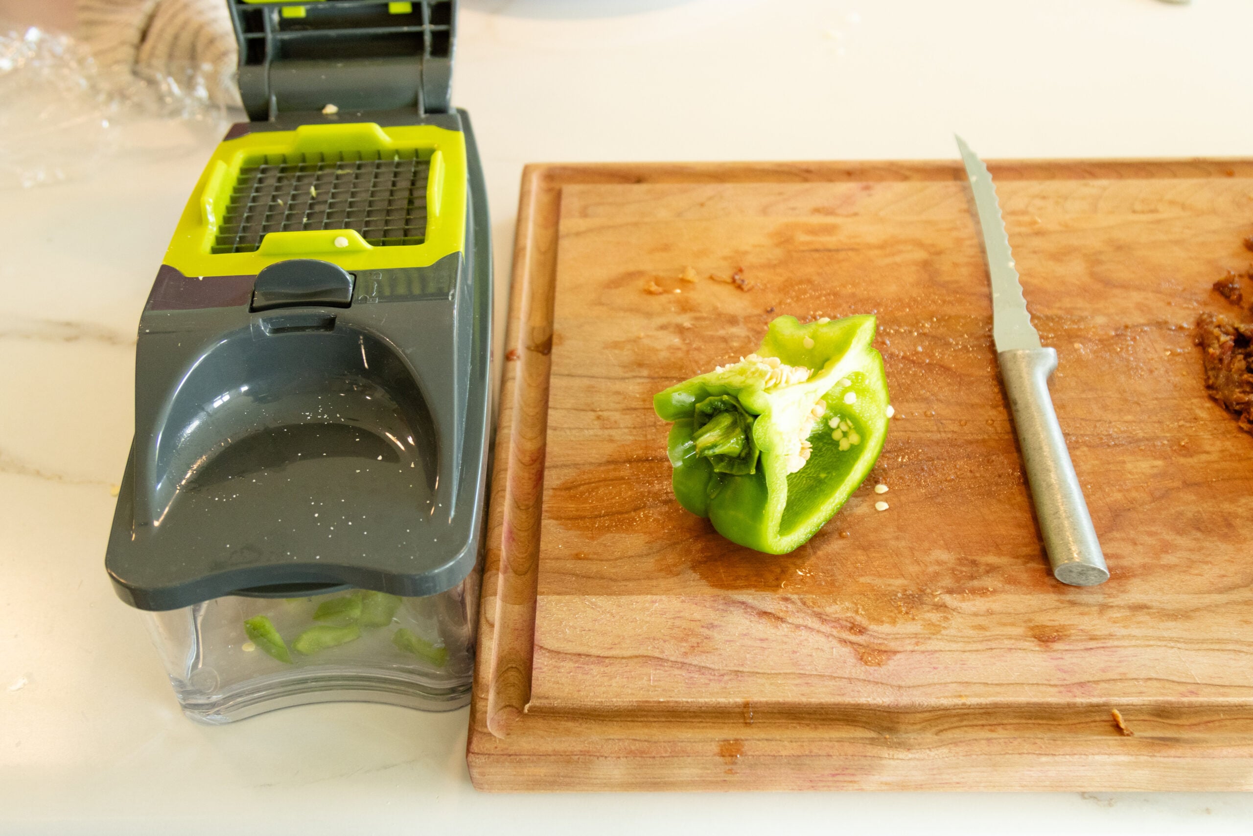 dicing the vegetables with the veggie chopper